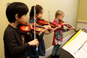 Students learn about music at New School of Music in Cambridge