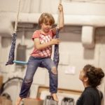 Kids learn aerial skills from experienced teachers at Esh Circus Arts