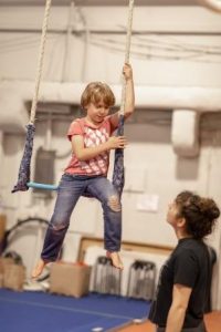 Kids learn aerial skills from experienced teachers at Esh Circus Arts