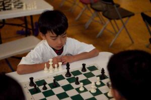 Kids learn how to master chess